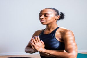 Image of black woman meditating